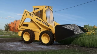 New Holland L555 and John Deere 675/B